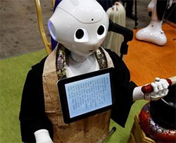 Preti robot per funerali economici