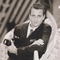 C. Fotografo